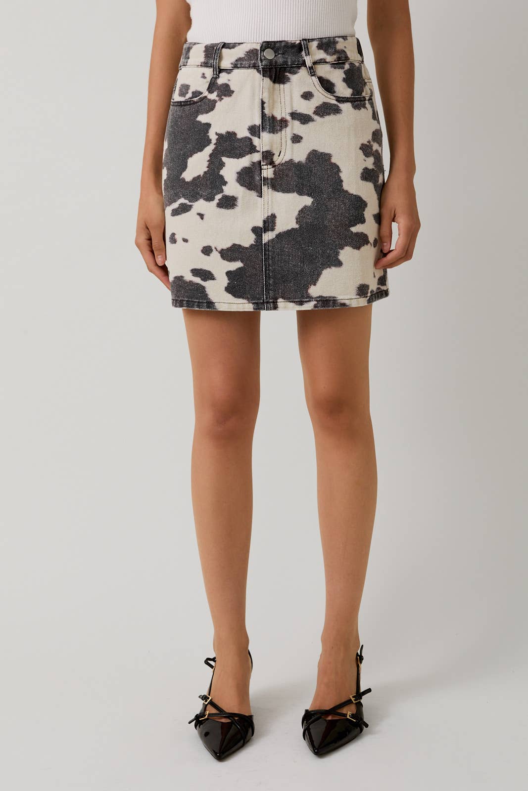 COW PRINT POCKET DETAIL MINI SKIRT